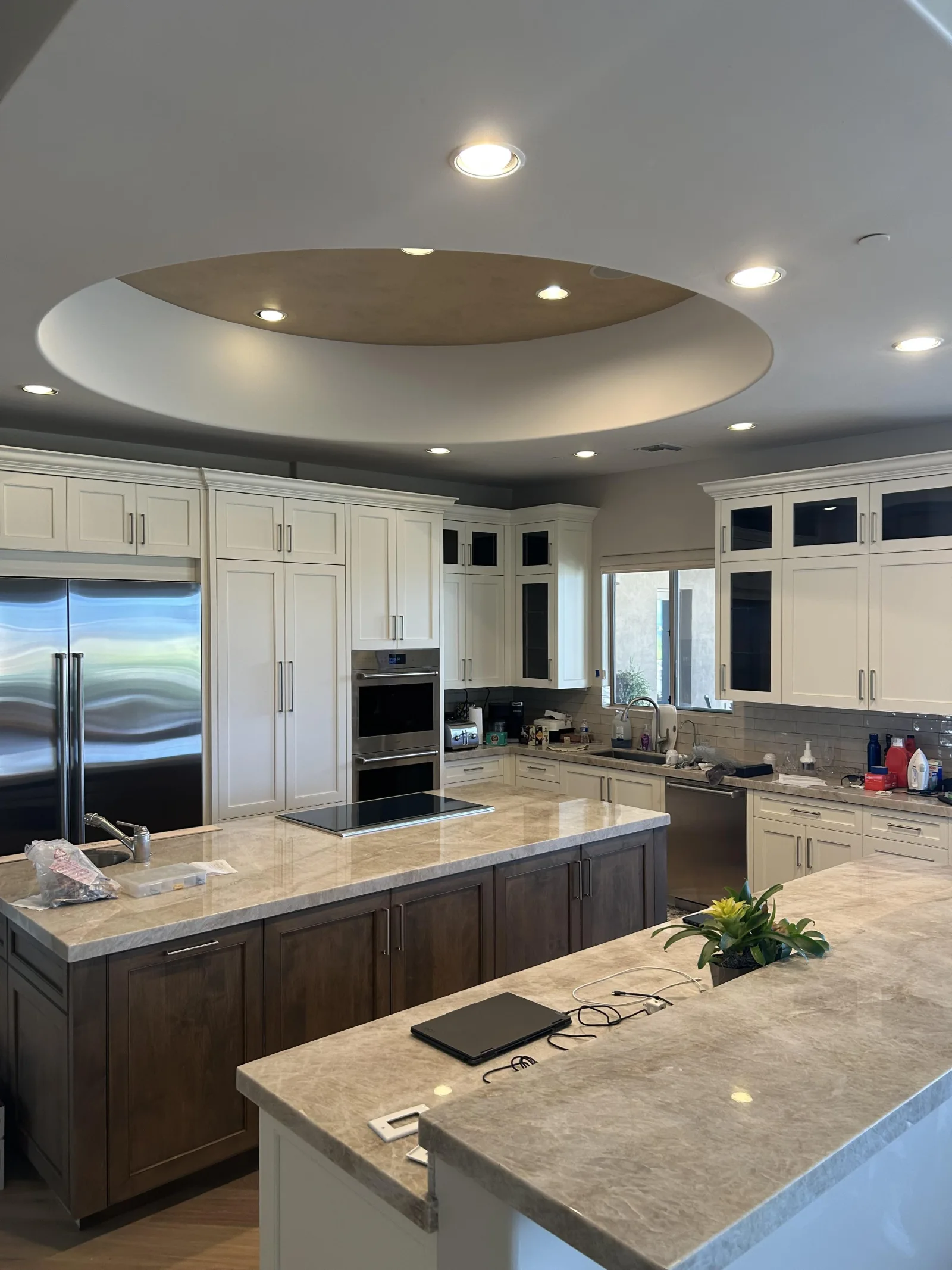 Scottsdale kitchen with Taj Mahal quartzite countertops and custom cabinetry